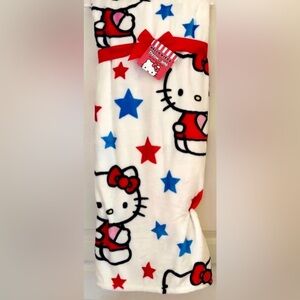 Hello Kitty throw red and blue stars and Kitty dressed in red